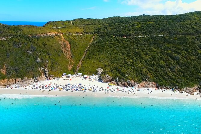 Boat Tour in Arraial do Cabo from Buzios with Lunch - Statue stop and Blue Grotto views: the wow before the swims