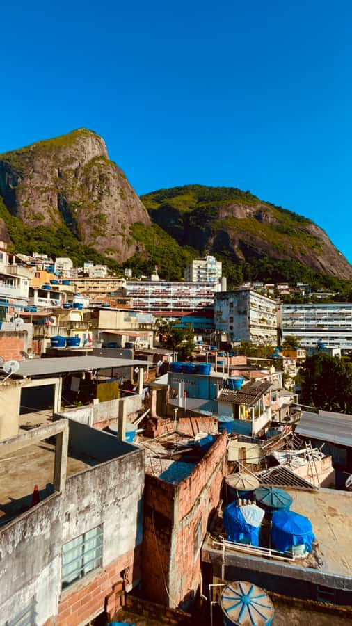 Hike Dois Irmãos + Vidigal Favela Experience - Walking Vidigal after the climb: street art and real context